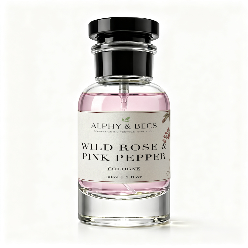 Perfume bottle labeled 'Wild Rose & Pink Pepper' by Alphy & Becs 
